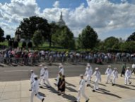 Sailors exit the U.S. Capitol Grounds on Friday, Aug. 31, 2018 after following crowds paying their respect to the late Sen. John McCain,.